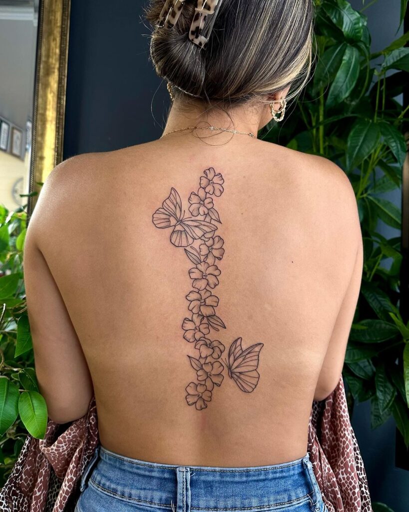 floral spine line tattoo