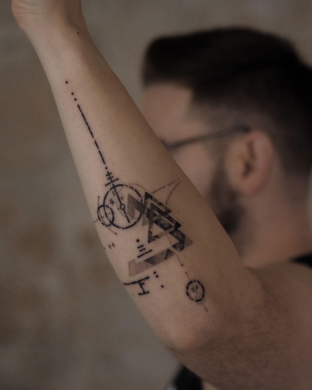 geometric forearm tattoo