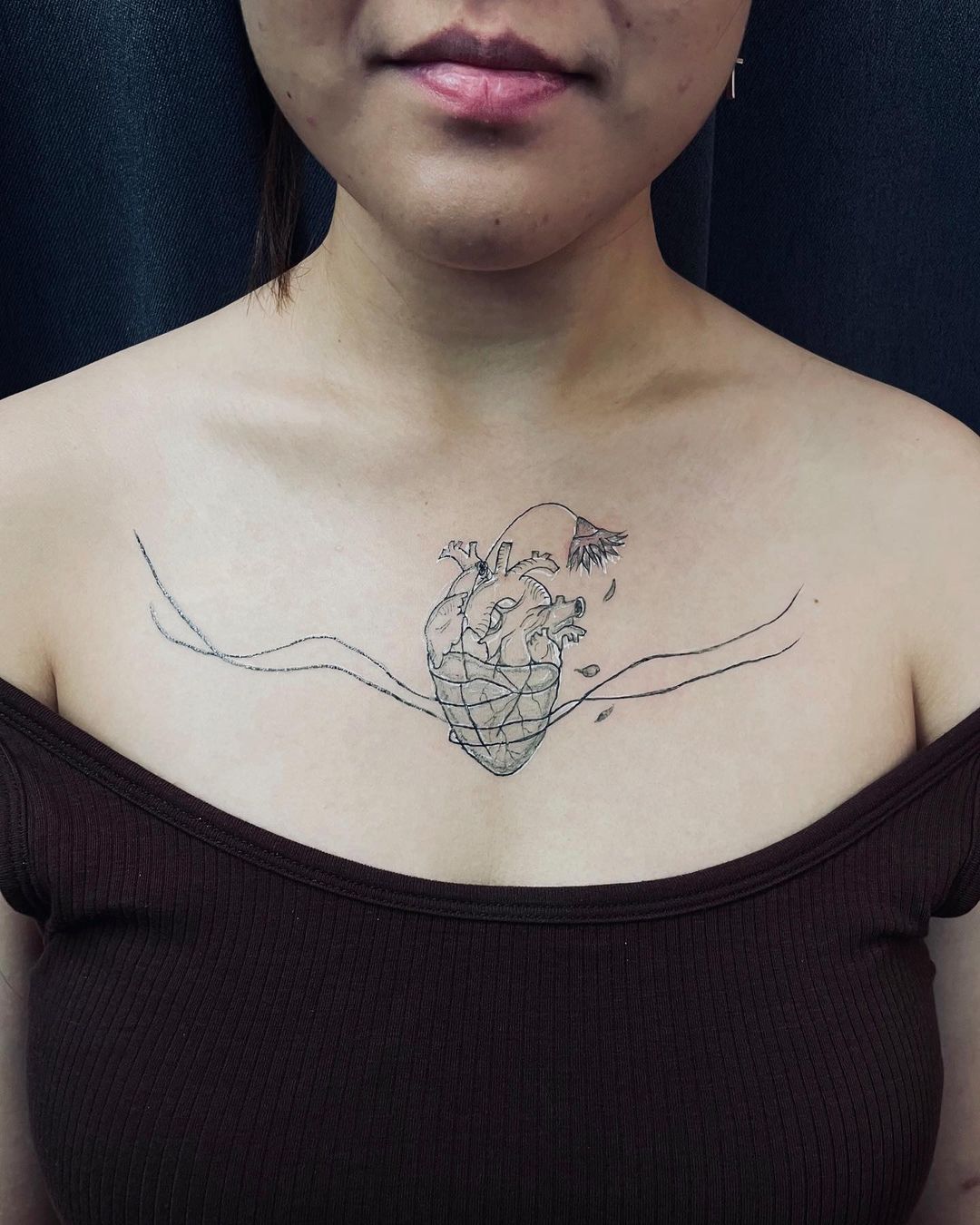 tatuagem de cordas de coração