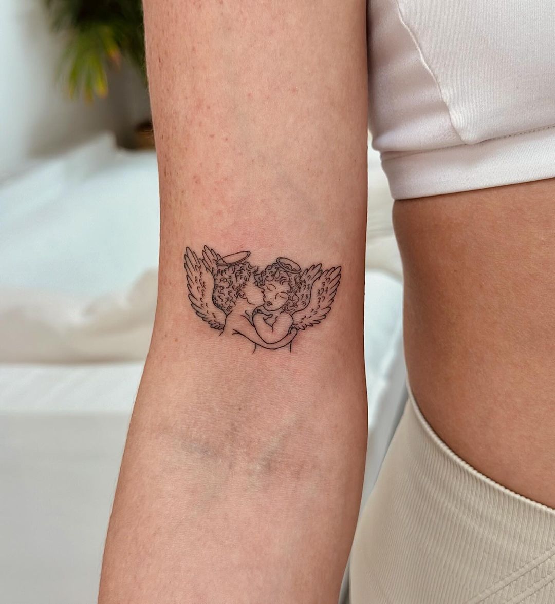 tatuagem de anjos amorosos