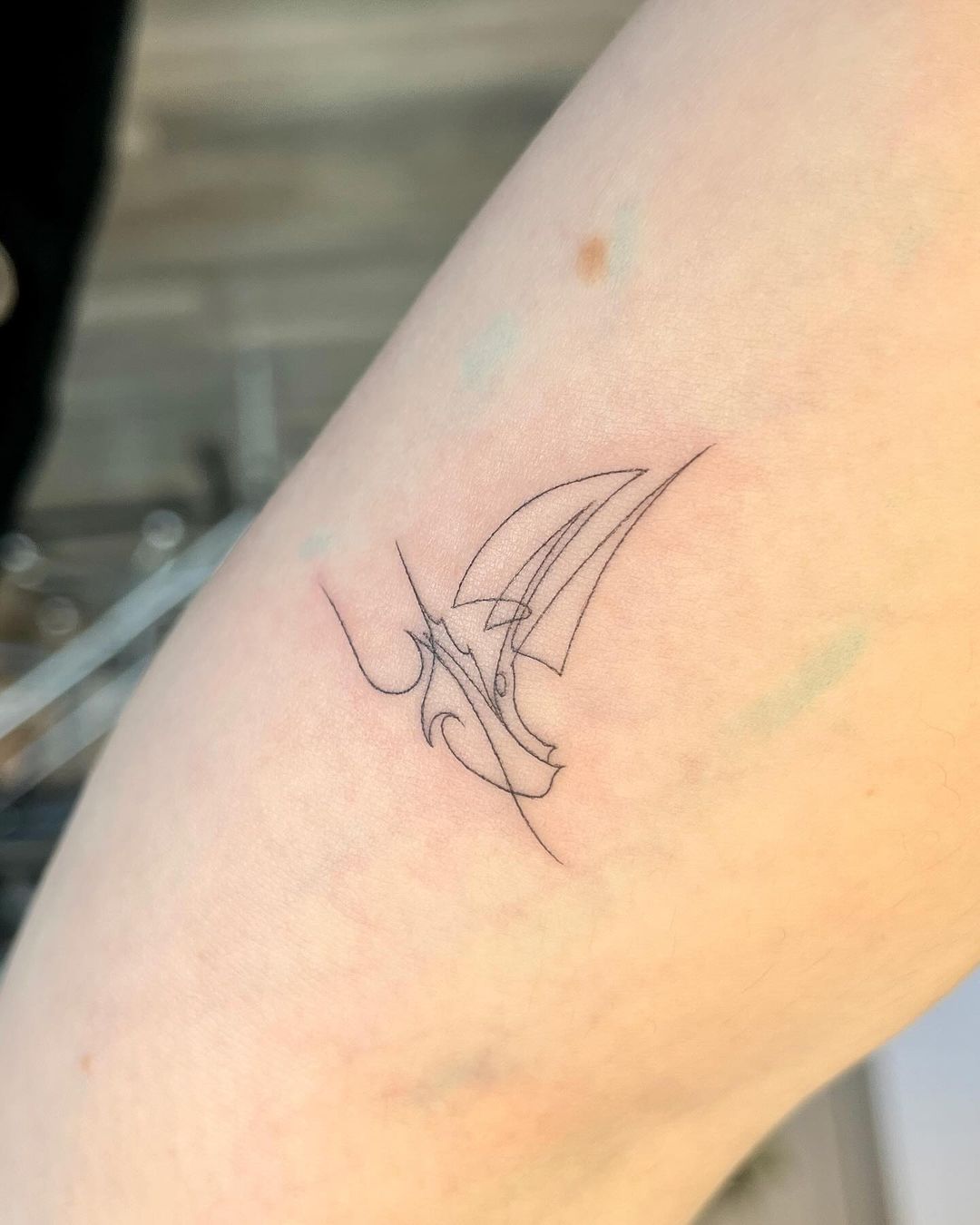 tatuaggio con barca a vela