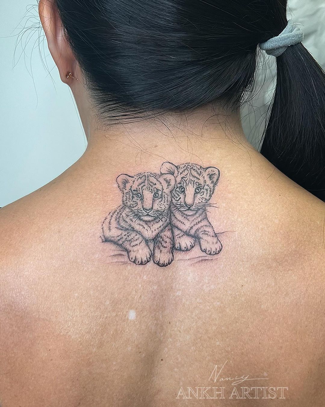 tatuagem de dois tigres