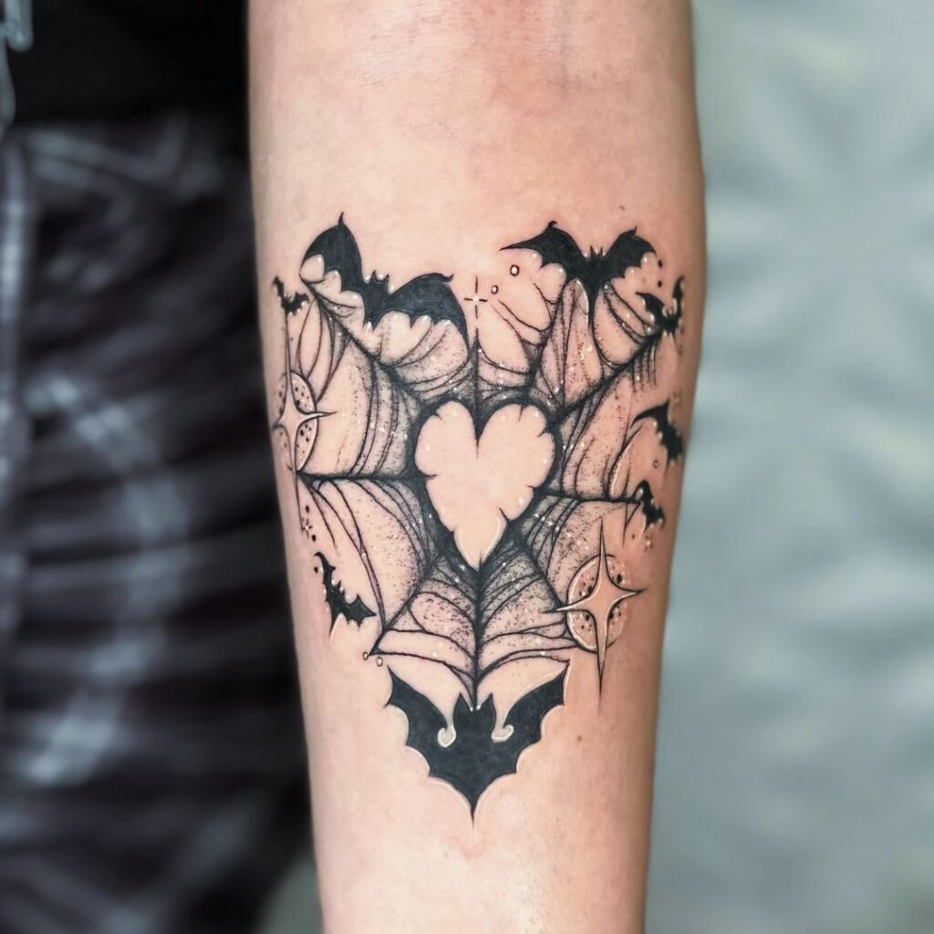 Tatuagem de teia de aranha