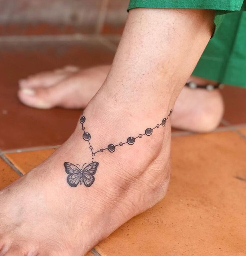 Tobillera con dije de mariposa Tat