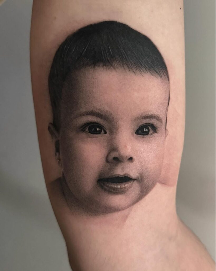 Impressive Tattoo Portrait Of A Baby