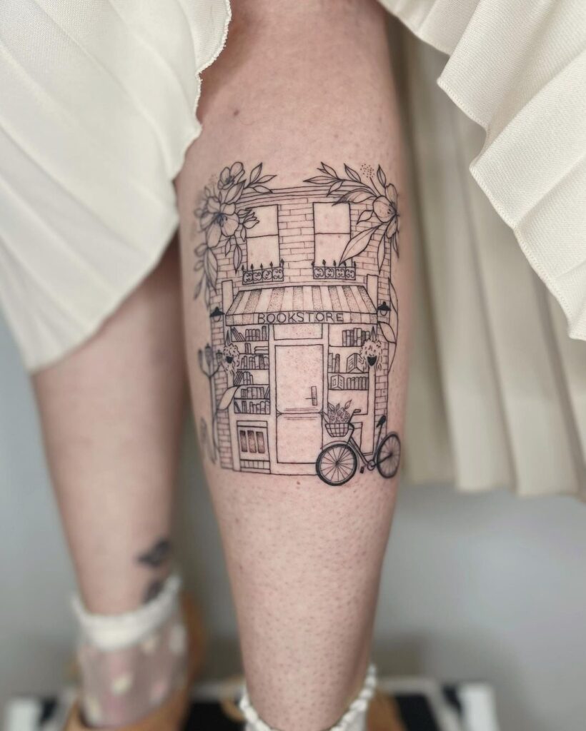 Tatuaggio della gamba della libreria