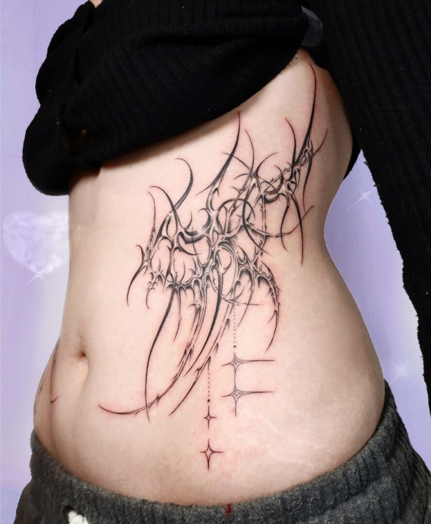 26 Bold And Cool Side Stomach Tattoos That Are Pure Art