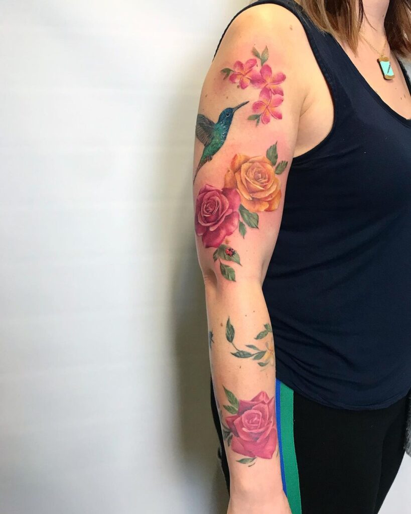 Tatuaje floral de manga completa