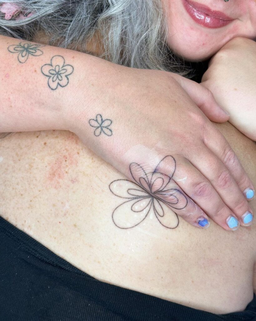 Tatuaggio della metà del fiore