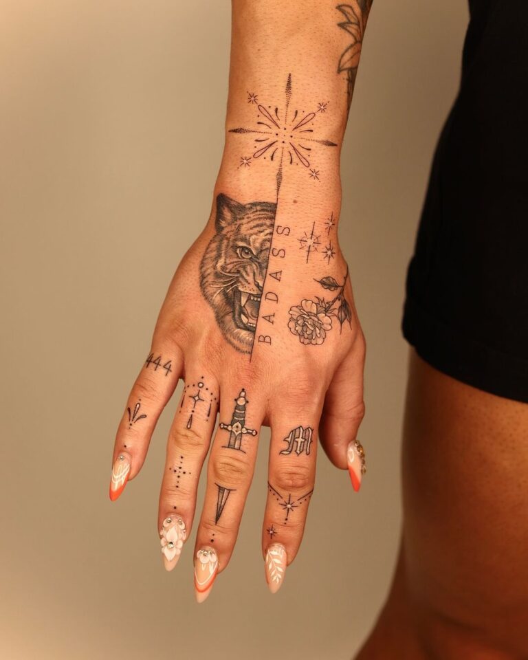 Hand Tattoo With Many Elements