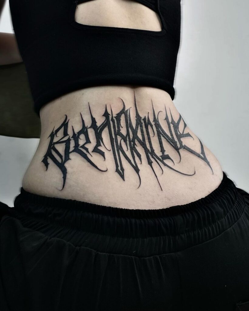 Lower Back Dark Tattoo