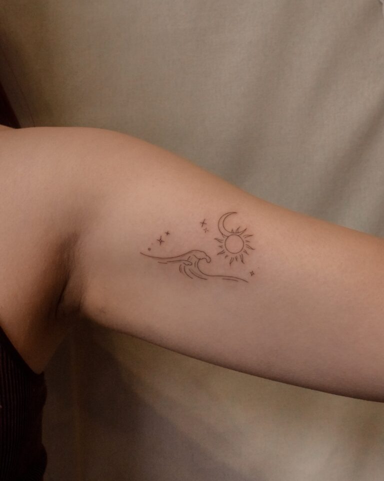 Tatuagem de mar, sol e lua