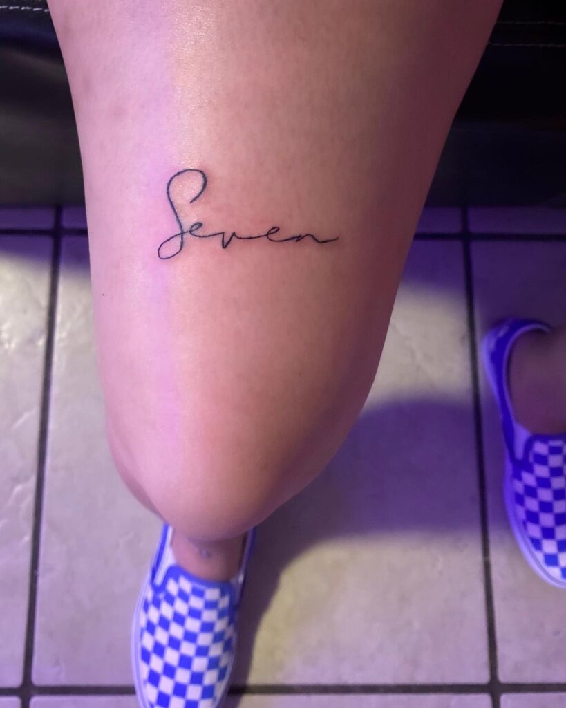 Seven Over The Knee Word Tattoo