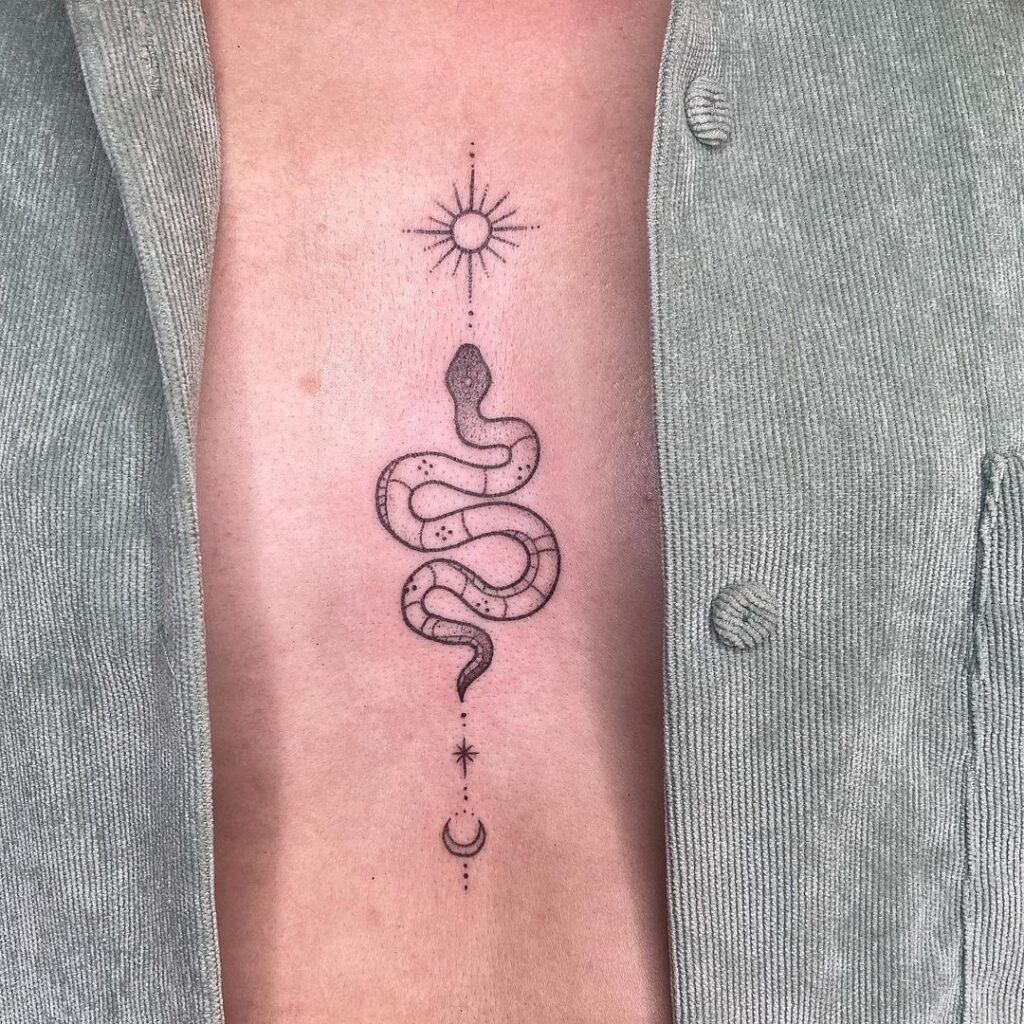 Sternum Serpent Tattoo