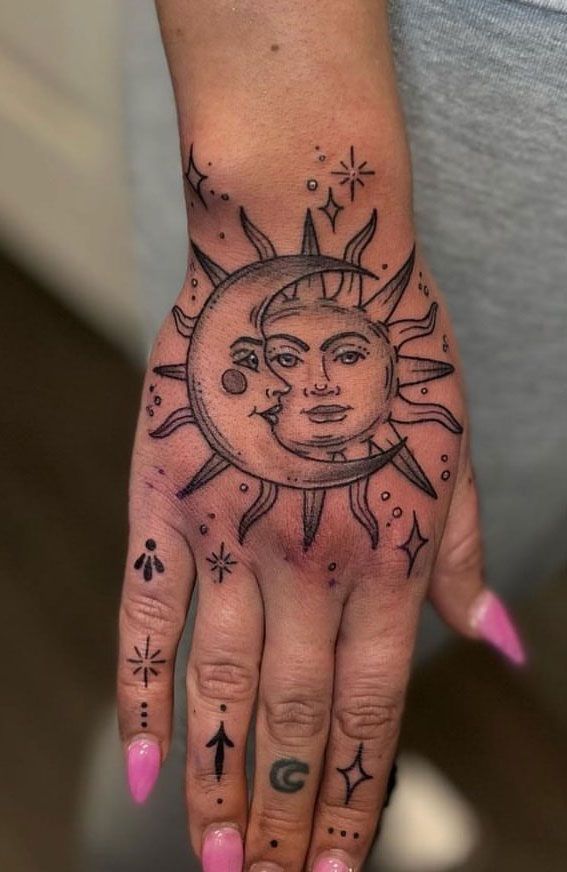 Sun And Moon Hand Tattoo