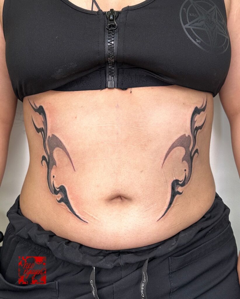 Symmetrical Stomach Tattoo