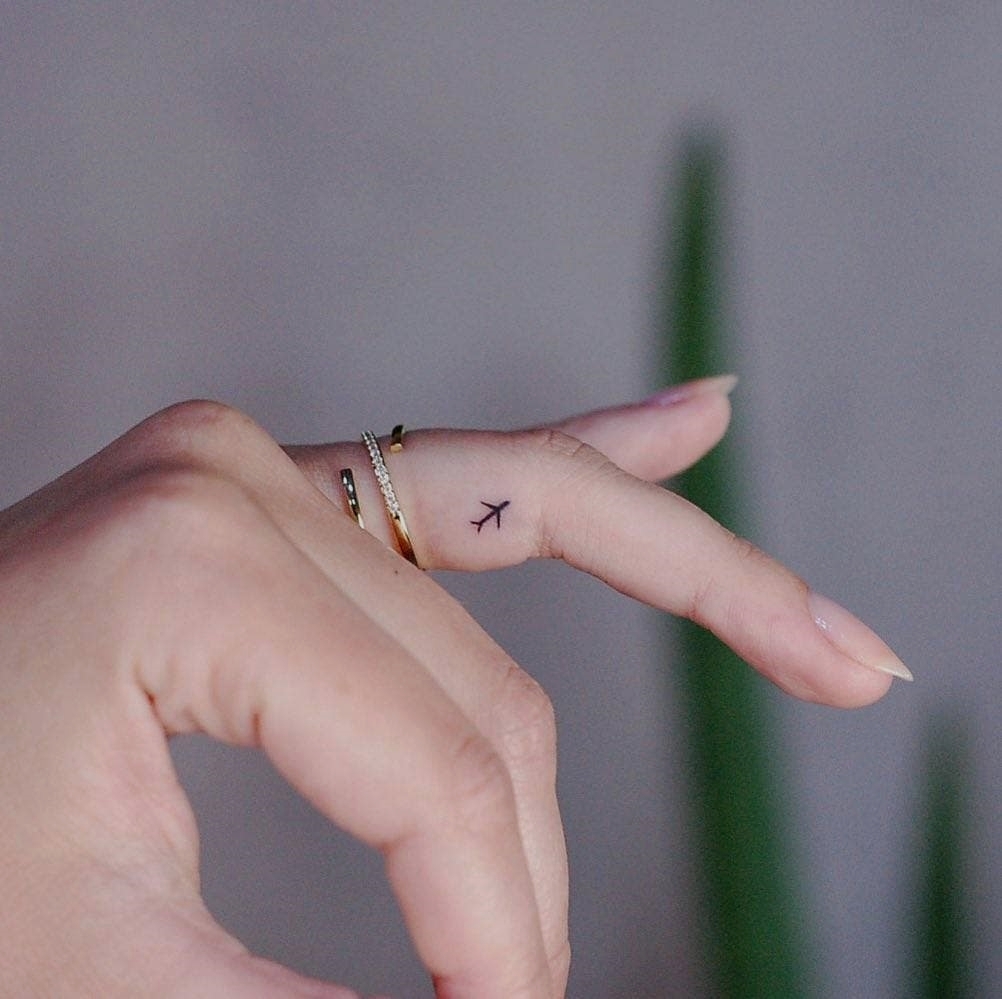 Tiny Airplane Tattoo