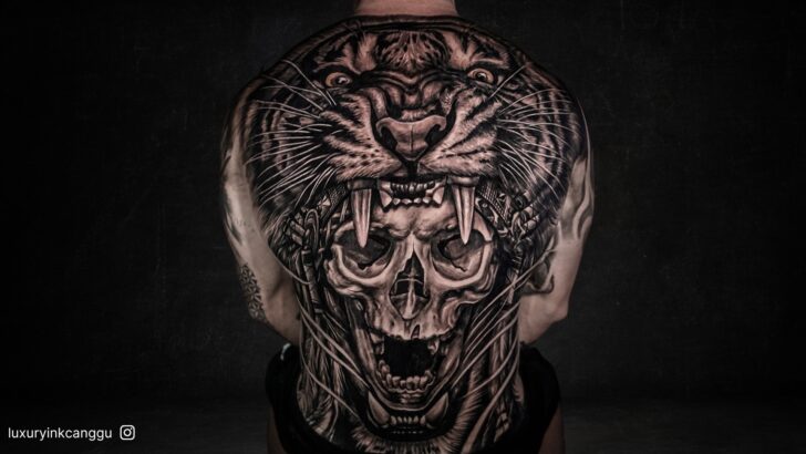 25 Bold & Powerful Back Tattoos For Men