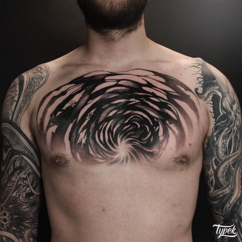 Abstract Full-Chest Tattoo