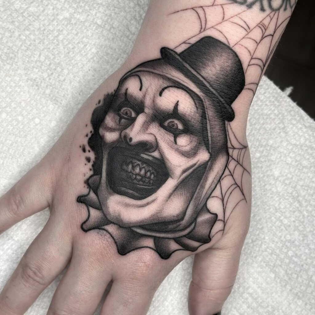 Art The Clown Hand Tattoo