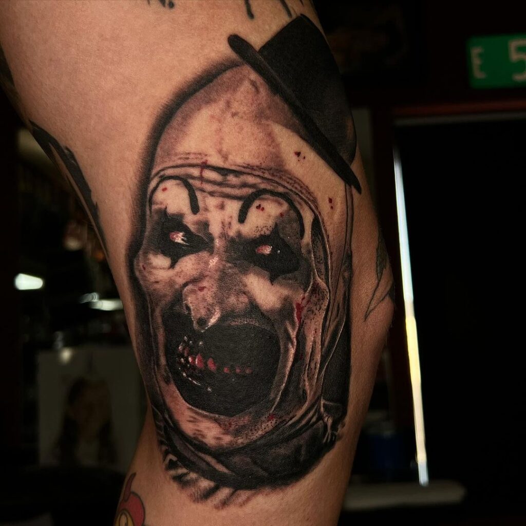 Art The Clown Thigh Tattoo