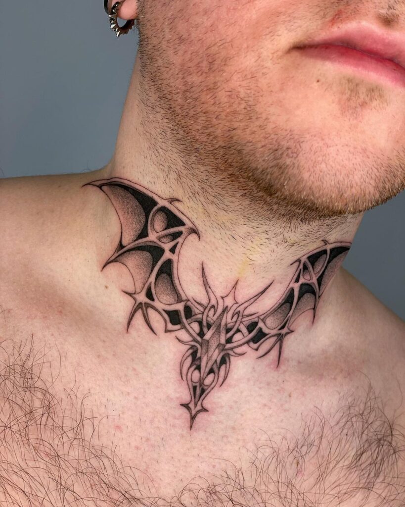 Bat Neck And Throat Tattoo