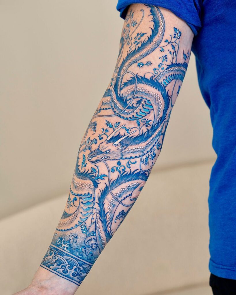 Tatuaje de manga de dragón azul