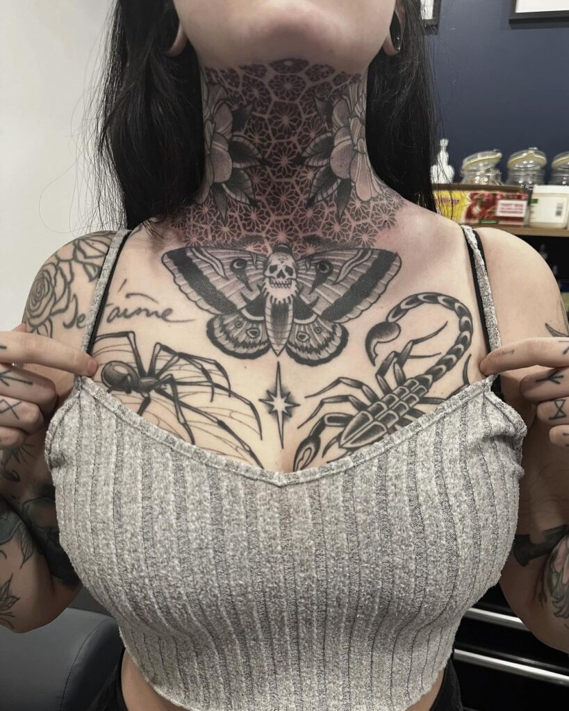 Bold Chest And Neck Tattoo