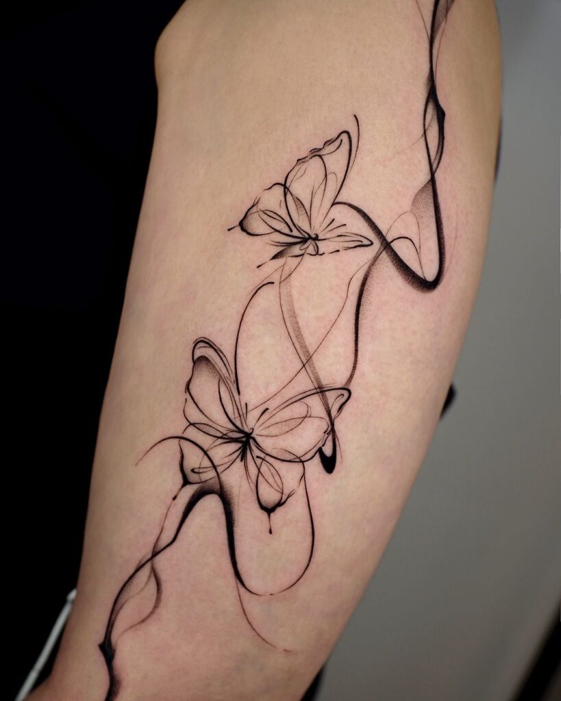 Tatuaggio a flusso di farfalle