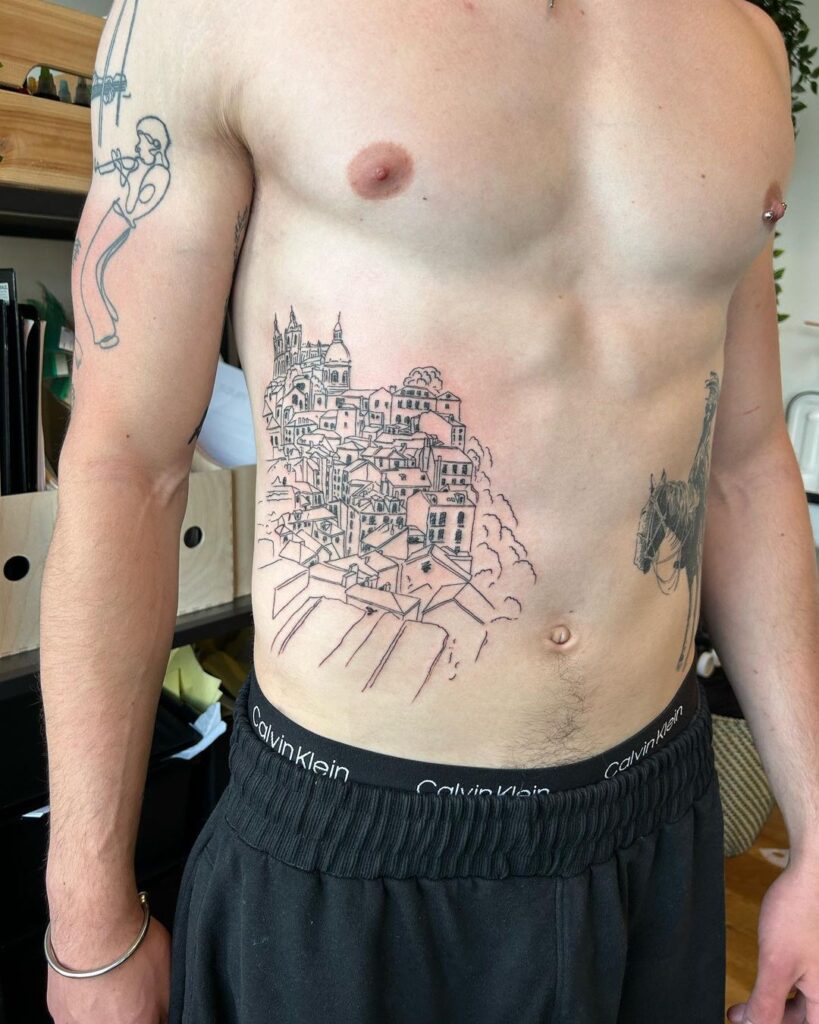 Tatuaggio con linee di contorno della città