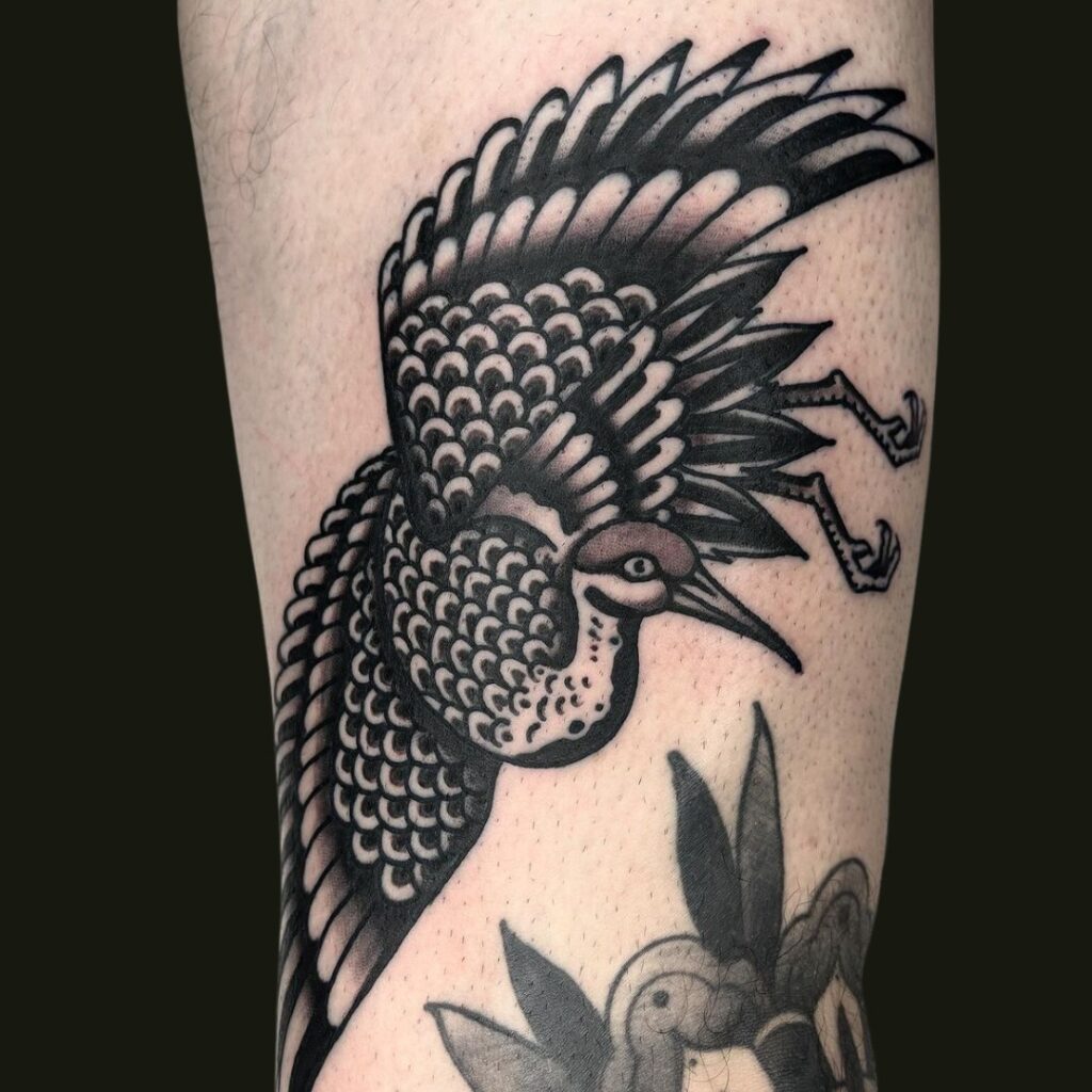 Tatuaje clásico de grulla