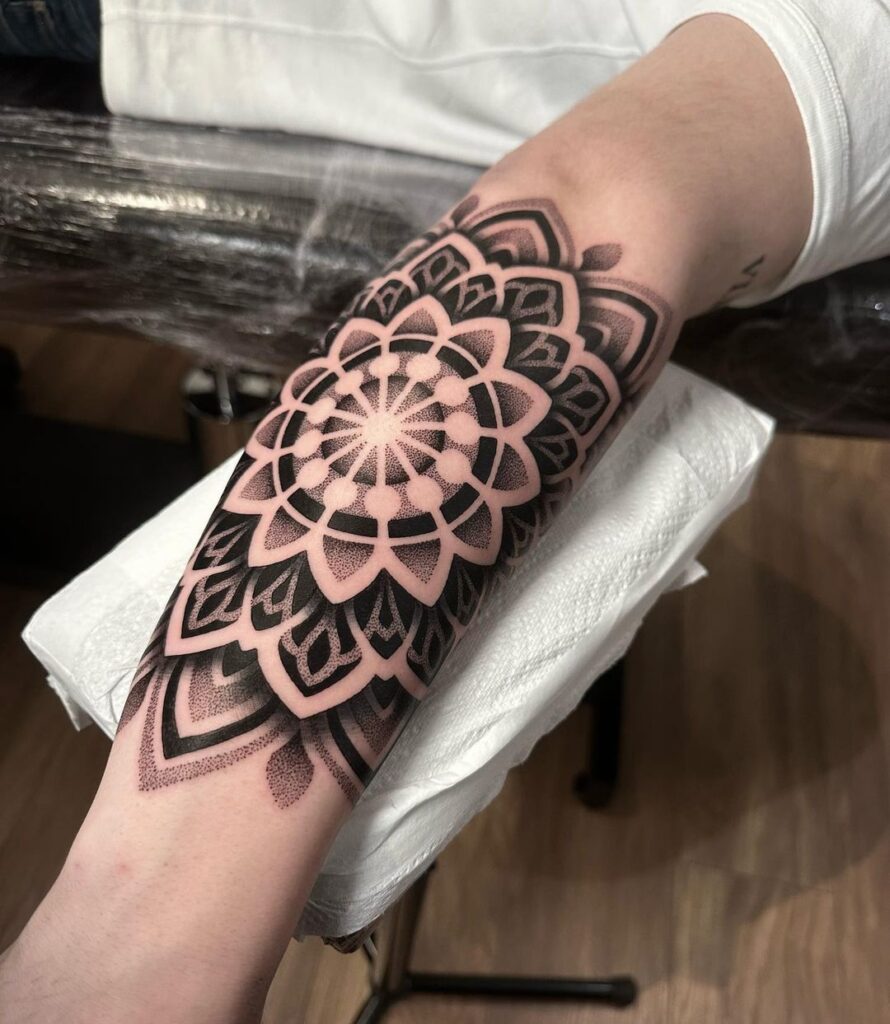 Dotwork Mandala Outside Forearm Tattoo