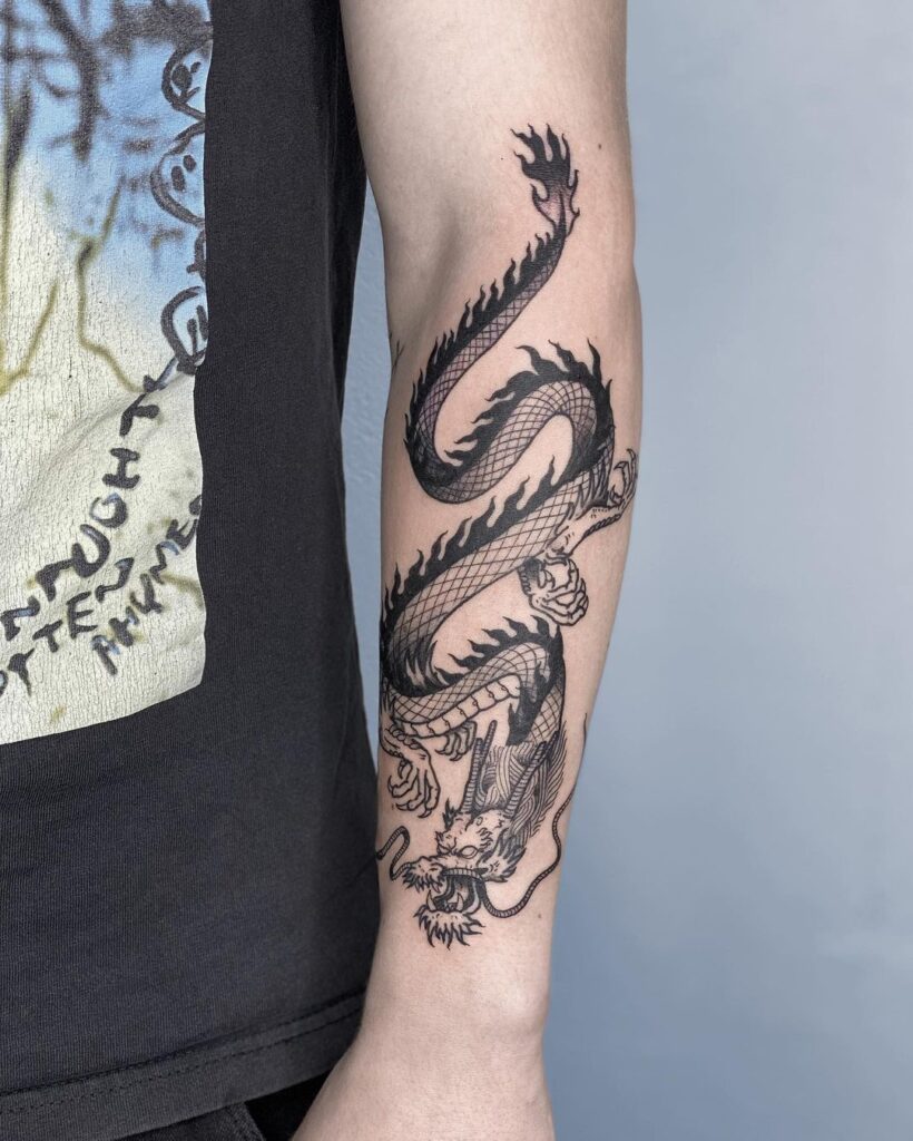 Dragon Outside Forearm Tattoo