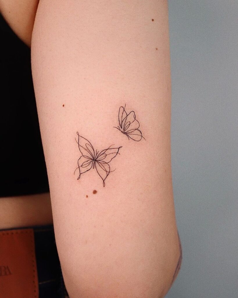 Fine-Line Butterflies Tattoo