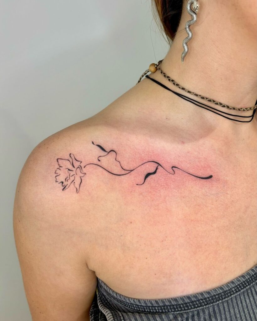 Flowy Floral Collarbone Tattoo