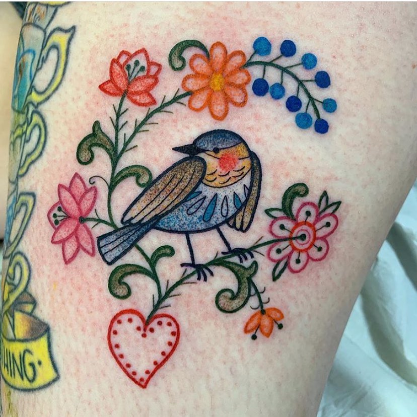  Tatuaje de pájaro de arte popular