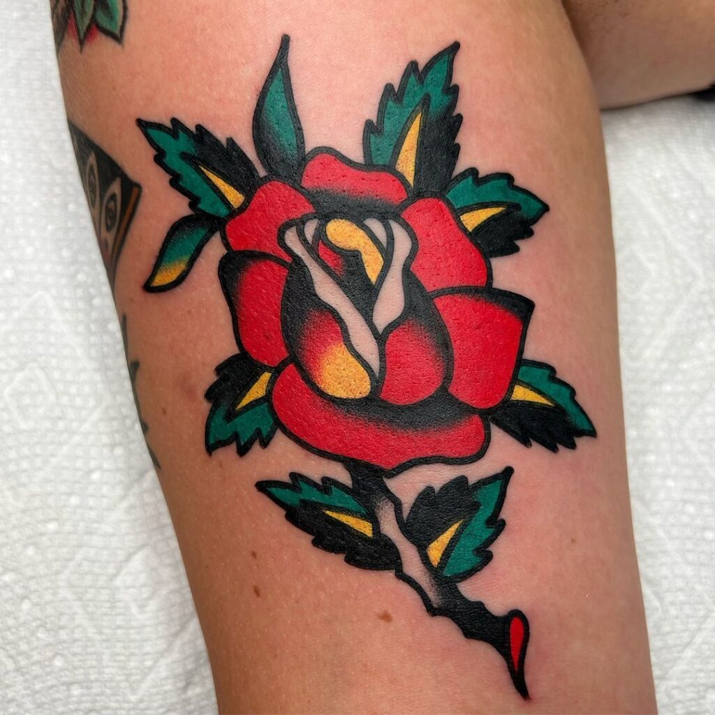 Tatuagem de rosa folclórica