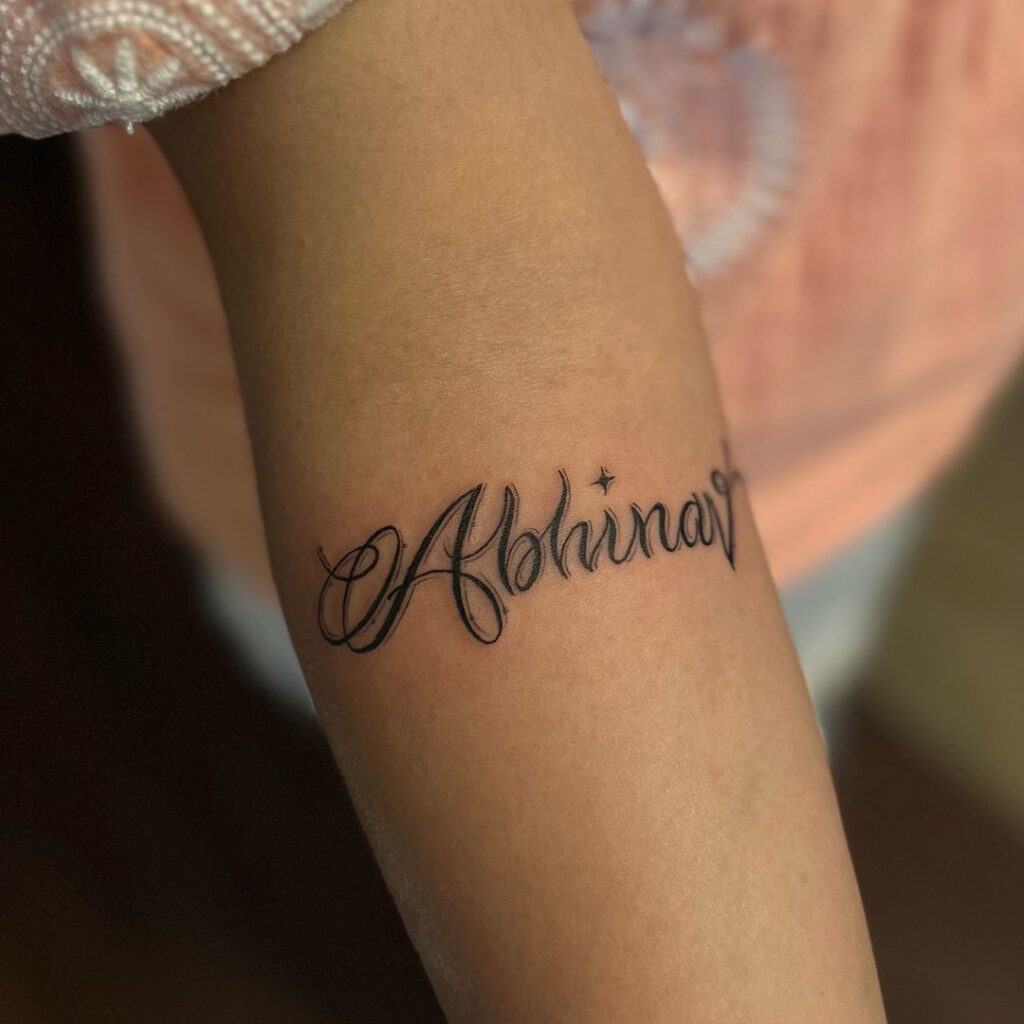 Hand Drawn Name Tattoo