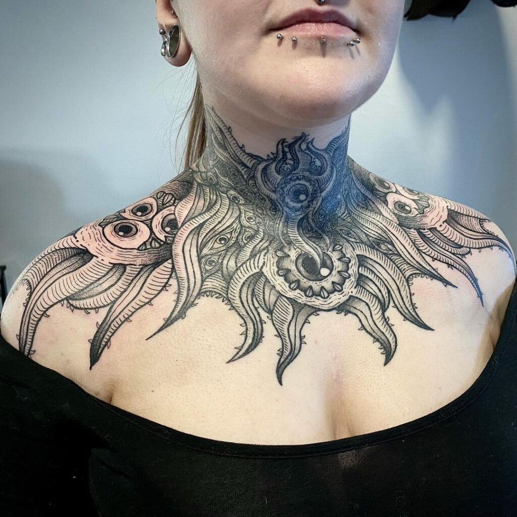 Lovecraftian Neck And Chest Tattoo