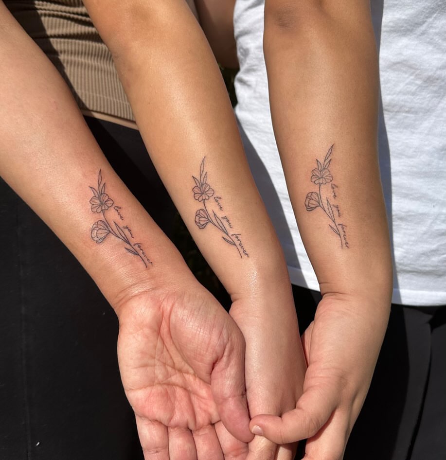 Matching Flowers With Script Tattoo