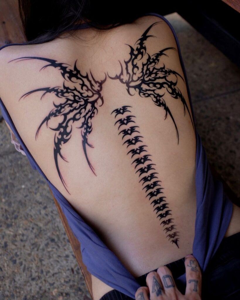 Neo Tribal Back And Spine Tattoo