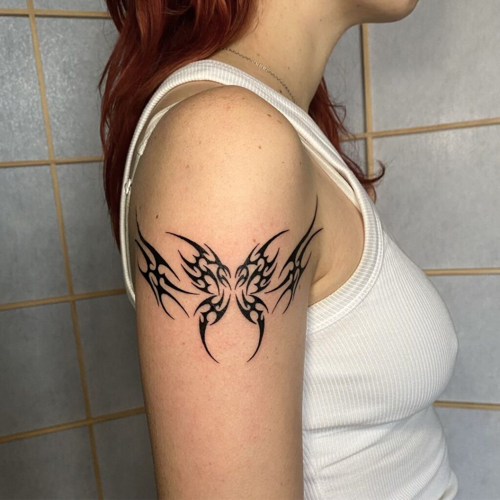 Neo Tribal Butterfly Arm Tattoo