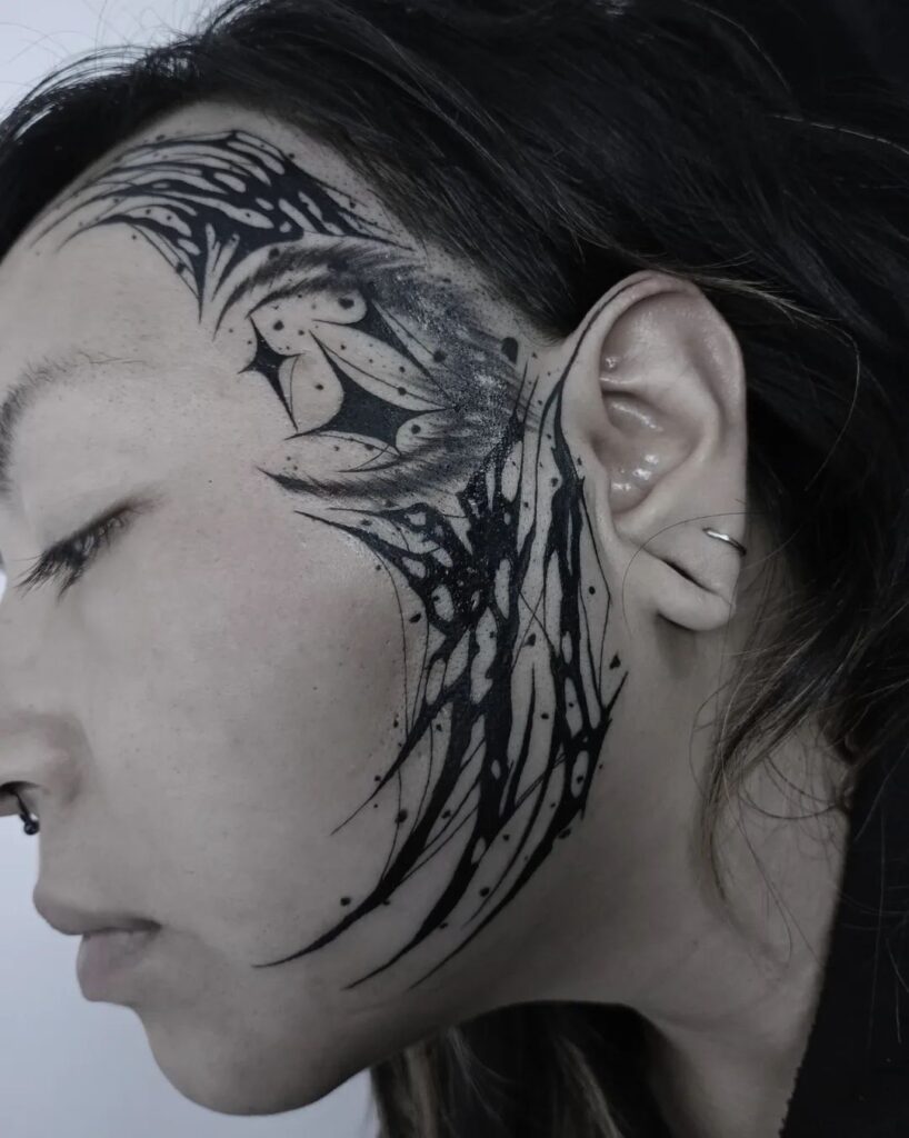 Neo Tribal Face Tattoo