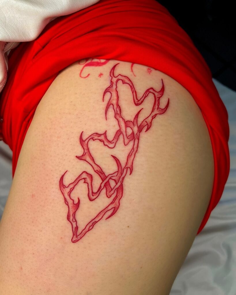 Neo Tribal Hip Tattoo In Red Ink