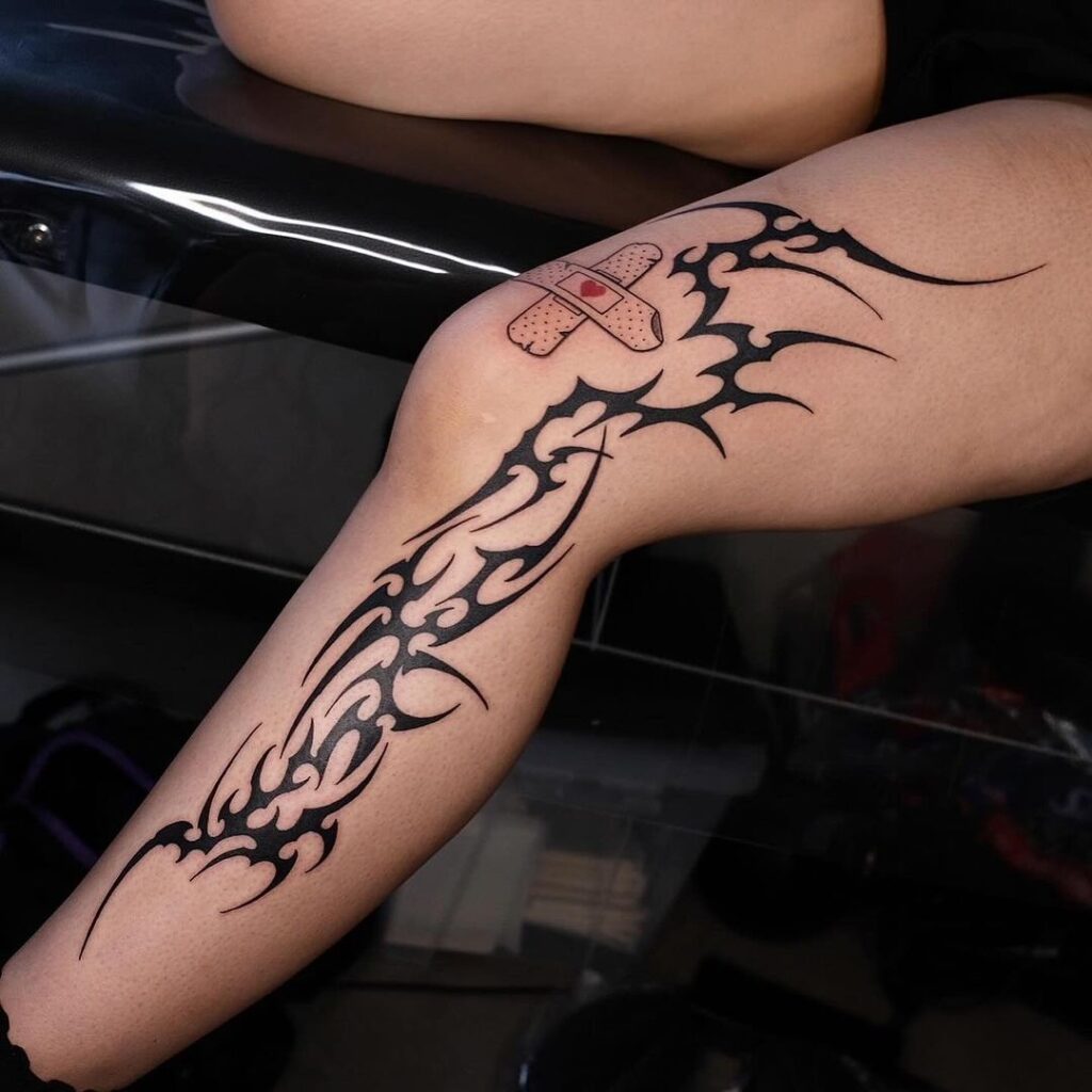 Neo Tribal Leg Tattoo With Band Aid