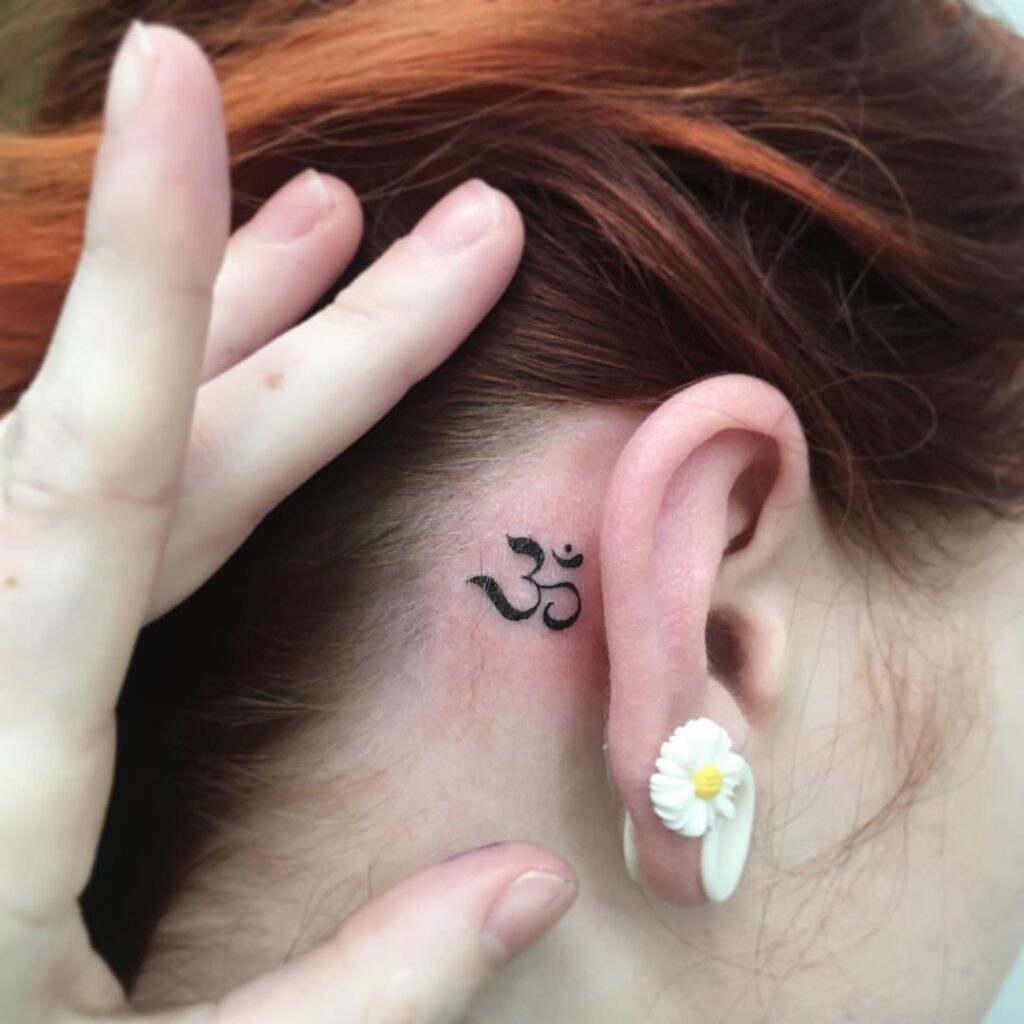 Om Symbol Inked Behind The Ear