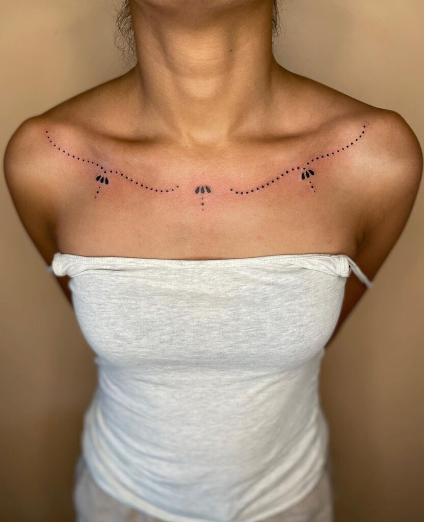 Ornate Collarbone Tattoo