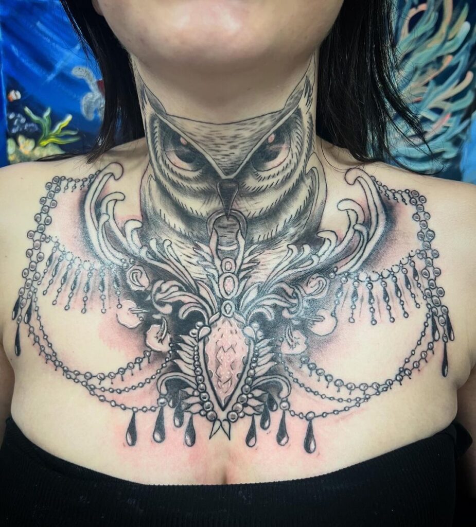 Owl Chest And Neck Tattoo