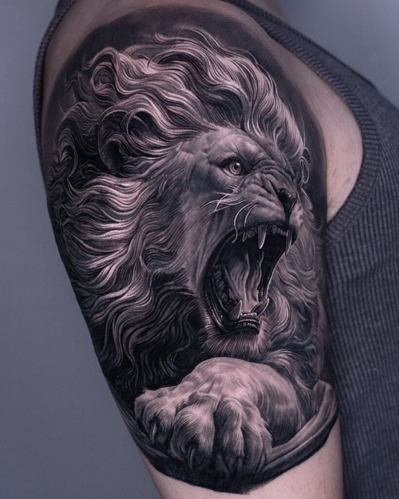 Powerful Lion Arm Tattoo