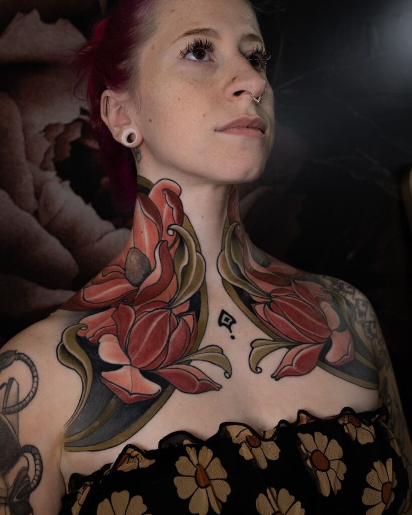 Red Flowers Chest And Neck Tattoo